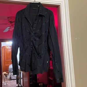 Black long sleeve top.